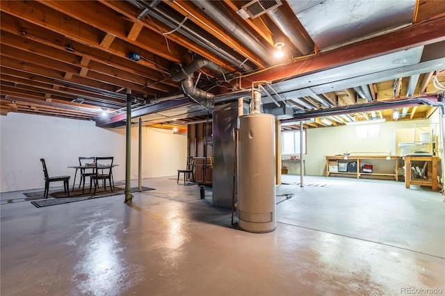 basement featuring water heater