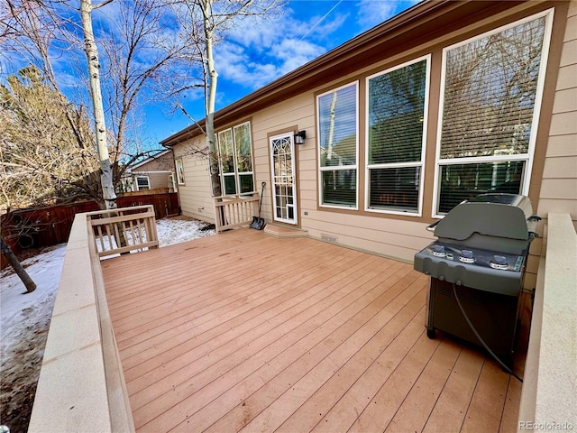 deck featuring fence and grilling area