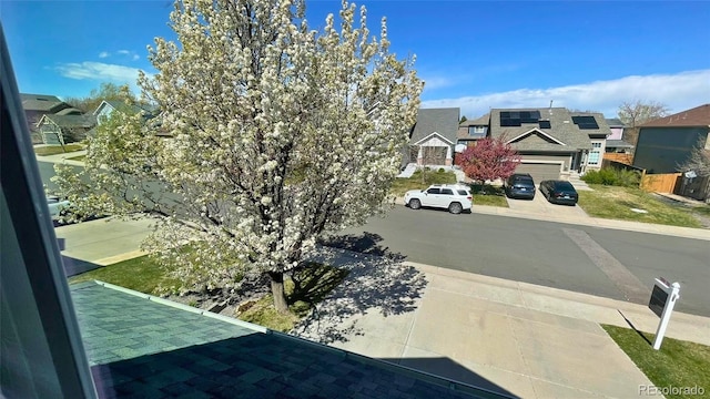 view of road featuring a residential view