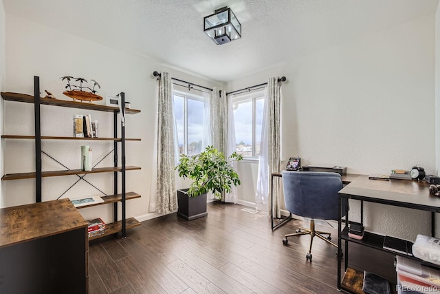 office area featuring a textured ceiling and dark hardwood / wood-style flooring