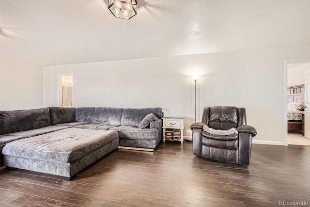 living room with a textured ceiling