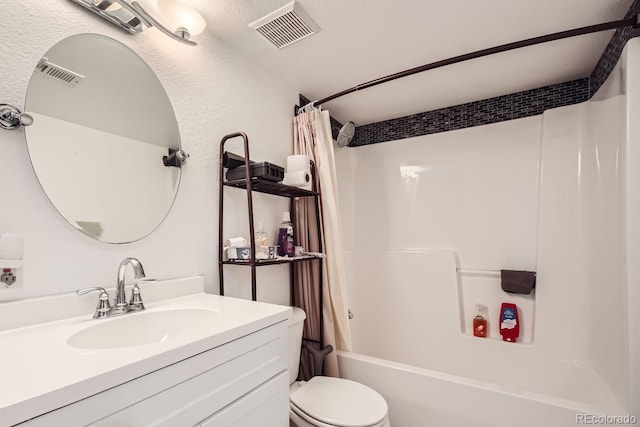 full bathroom with shower / tub combo, vanity, and toilet