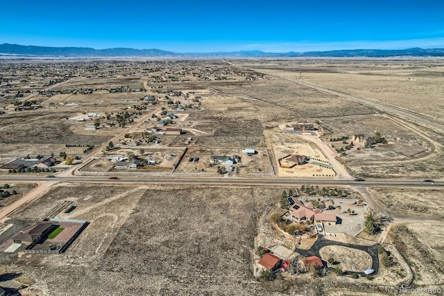 bird's eye view with a mountain view