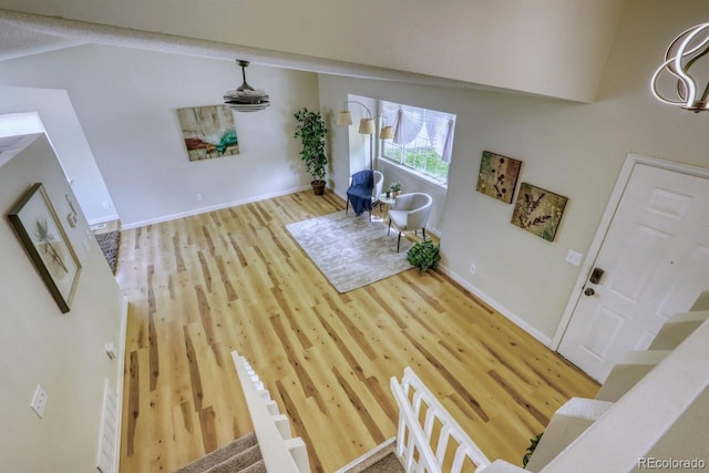 4302 Nepal St, Denver, CO 80249 - entrance foyer featuring vaulted ceiling, wood finished floors, and baseboards