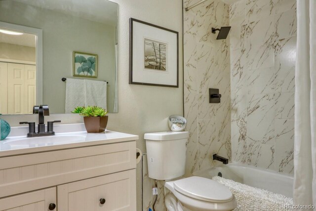 4302 Nepal St, Denver, CO 80249 - bathroom featuring vanity, toilet, and shower / bathtub combination with curtain