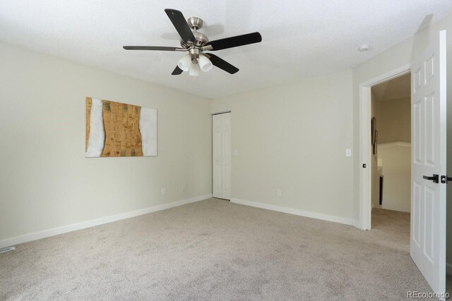 4302 Nepal St, Denver, CO 80249 - carpeted empty room with ceiling fan and baseboards