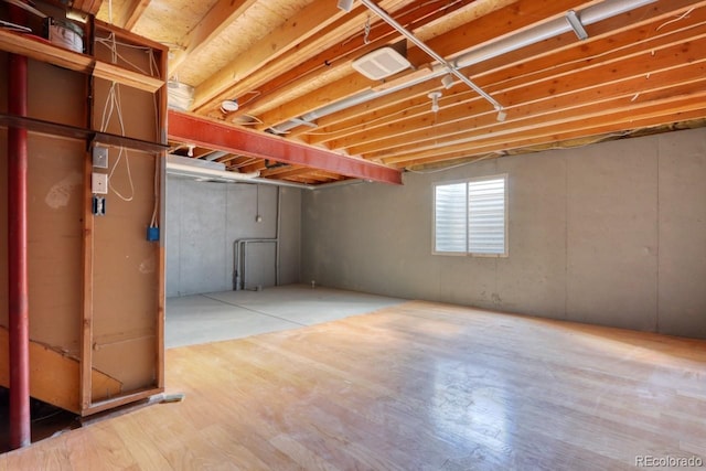 4302 Nepal St, Denver, CO 80249 - below grade area featuring wood finished floors