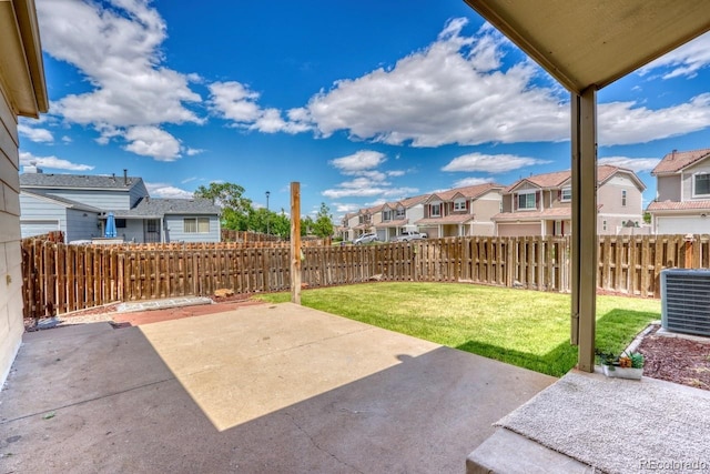 4302 Nepal St, Denver, CO 80249 - view of patio featuring a residential view and central AC unit