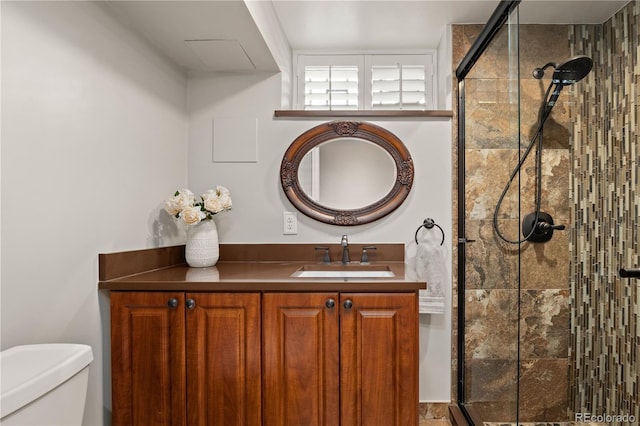 4425 Irving St, Denver, CO 80211 - full bath with a stall shower, toilet, and vanity