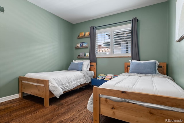 4425 Irving St, Denver, CO 80211 - bedroom featuring wood finished floors and baseboards