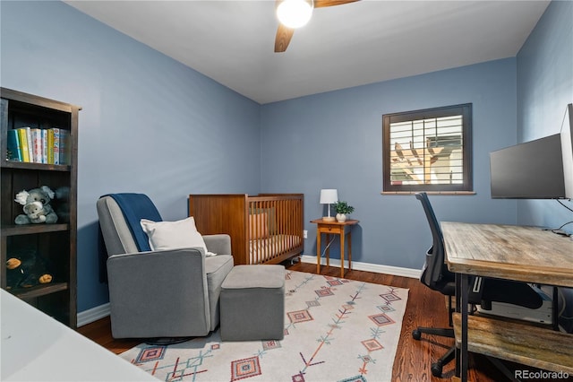 4425 Irving St, Denver, CO 80211 - bedroom with an office area, wood finished floors, baseboards, and ceiling fan
