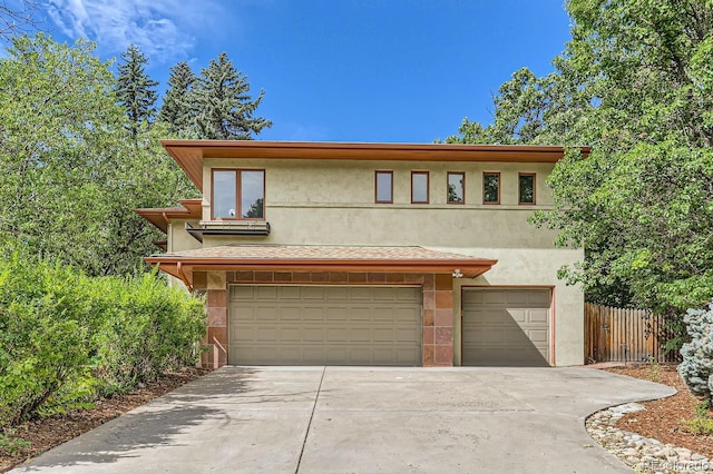 view of front of property with a garage