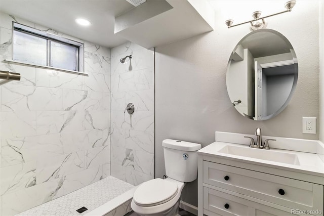 1927 S Peoria St, Aurora, CO 80014 - full bath featuring vanity and tiled shower