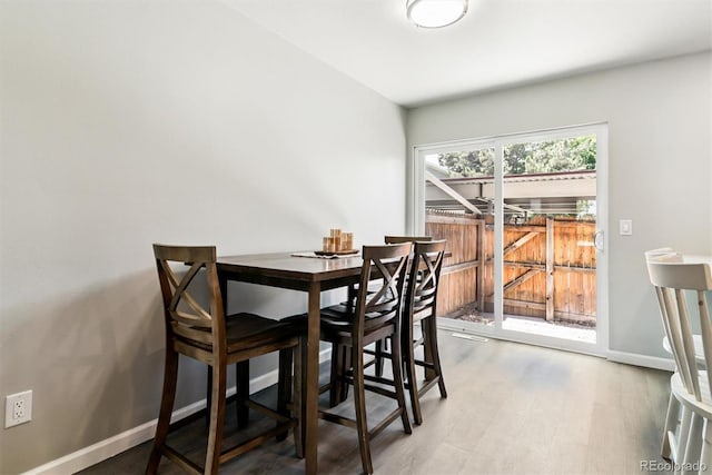 1927 S Peoria St, Aurora, CO 80014 - dining room featuring wood finished floors and baseboards