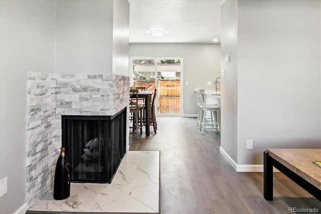 1927 S Peoria St, Aurora, CO 80014 - detailed view of wood finished floors and a stone fireplace