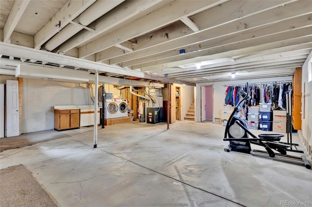 13624 Omega Cir, Lone Tree, CO 80124 - unfinished basement with washing machine and dryer, heating unit, and stairway