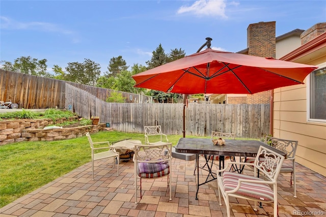 13624 Omega Cir, Lone Tree, CO 80124 - view of patio featuring a fire pit and outdoor dining space