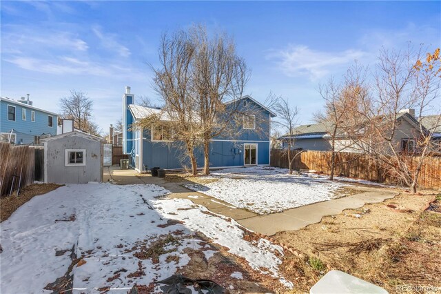 exterior space with a storage shed