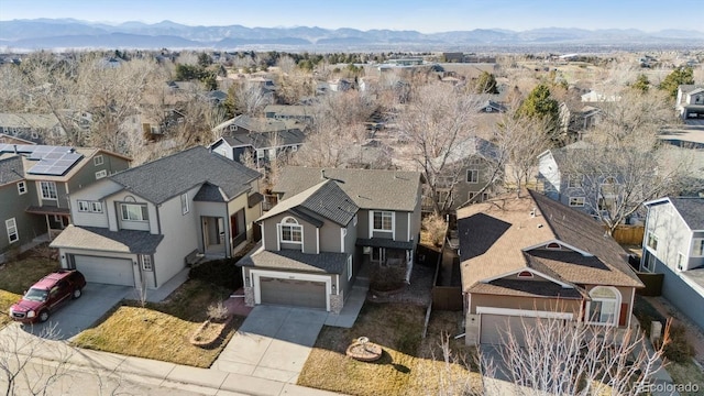 bird's eye view featuring a mountain view and a residential view