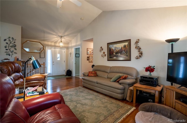 living area featuring wood finished floors, a ceiling fan, and high vaulted ceiling