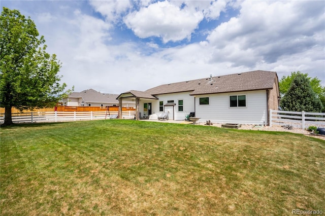 back of house with a patio