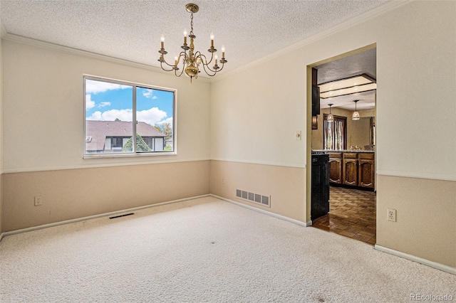7655 S Ogden Way, Centennial, CO 80122 - carpeted spare room with a chandelier, crown molding, a textured ceiling, and baseboards