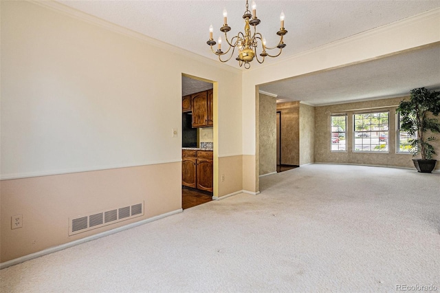 7655 S Ogden Way, Centennial, CO 80122 - carpeted empty room with a chandelier, crown molding, and baseboards