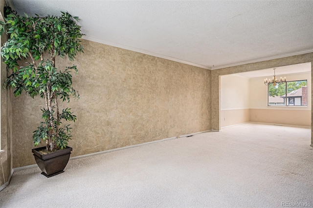 7655 S Ogden Way, Centennial, CO 80122 - carpeted empty room featuring a chandelier and ornamental molding