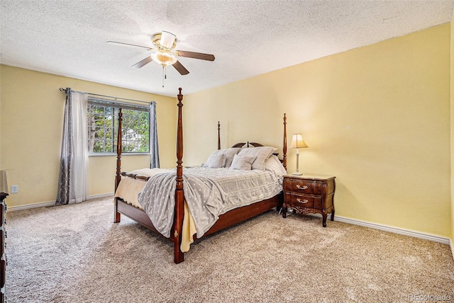 7655 S Ogden Way, Centennial, CO 80122 - bedroom featuring light colored carpet, baseboards, a textured ceiling, and ceiling fan