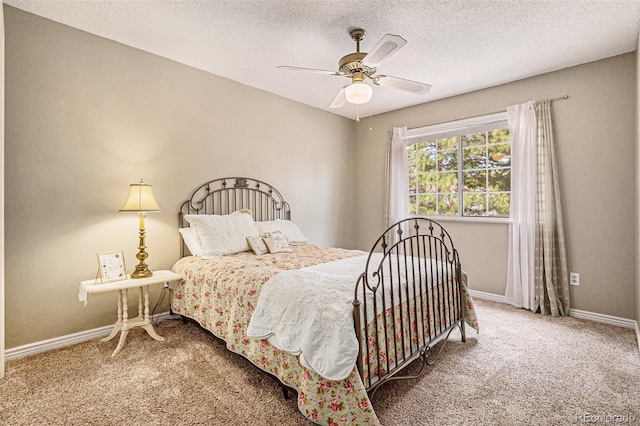 7655 S Ogden Way, Centennial, CO 80122 - bedroom with carpet, baseboards, a ceiling fan, and a textured ceiling