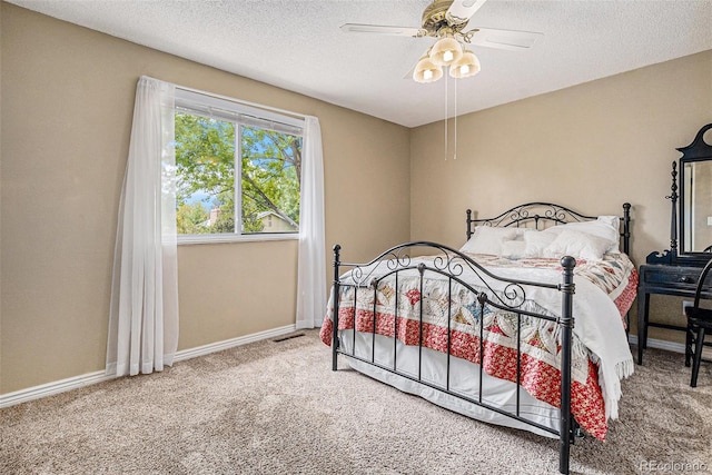 7655 S Ogden Way, Centennial, CO 80122 - bedroom with carpet, a textured ceiling, baseboards, and ceiling fan