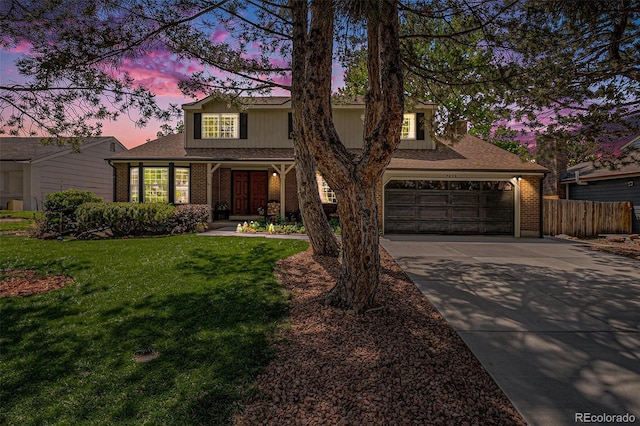 7655 S Ogden Way, Centennial, CO 80122 - traditional-style home with concrete driveway, brick siding, an attached garage, and a shingled roof