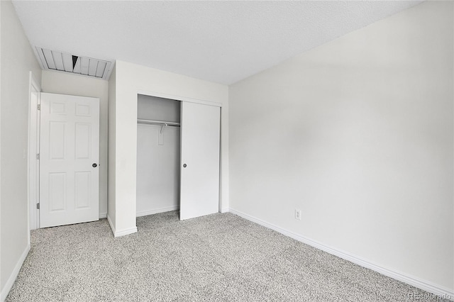9946 Harrison St, Thornton, CO 80229 - unfurnished bedroom with baseboards, carpet floors, a closet, and attic access