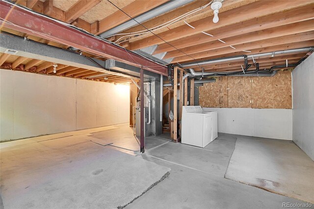 9946 Harrison St, Thornton, CO 80229 - unfinished basement with washer / clothes dryer and heating unit