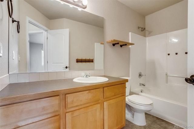 full bath featuring tile patterned flooring, vanity, toilet, and shower / bath combination