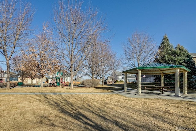 view of home's community with a gazebo, a lawn, and playground community