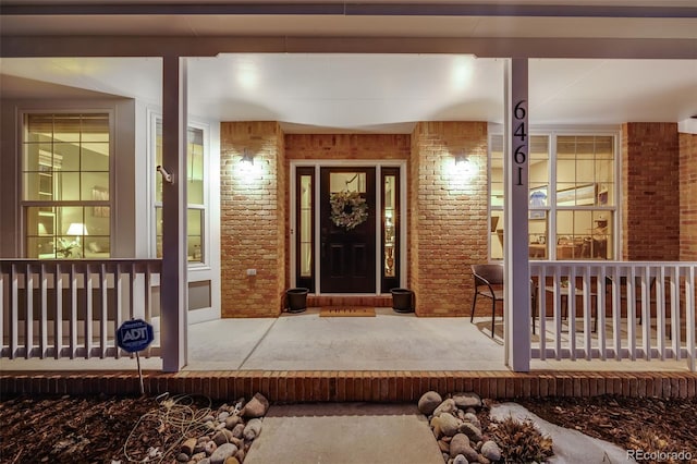 entrance to property with covered porch