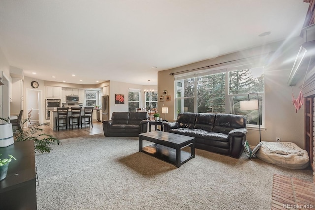 living room featuring an inviting chandelier