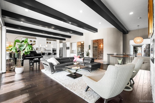 living room with beamed ceiling, dark wood finished floors, and recessed lighting