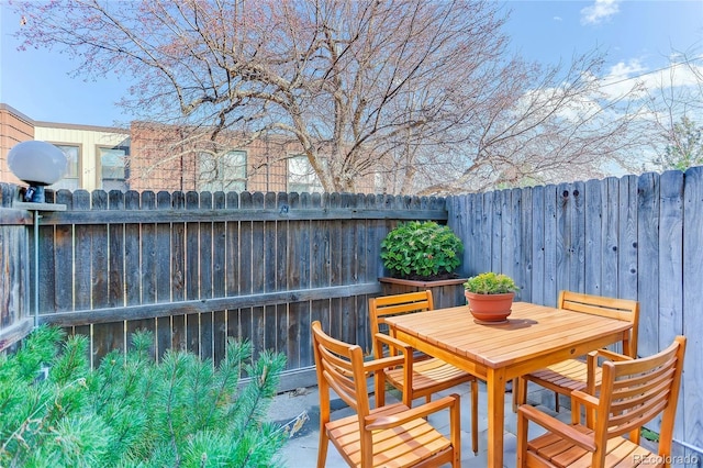 view of patio / terrace with fence