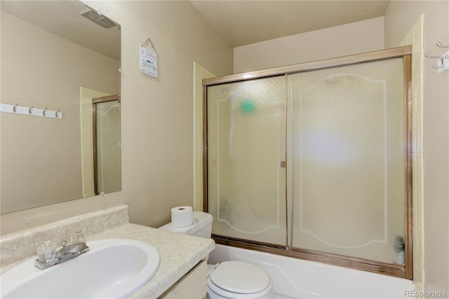 full bath with enclosed tub / shower combo, visible vents, toilet, and vanity