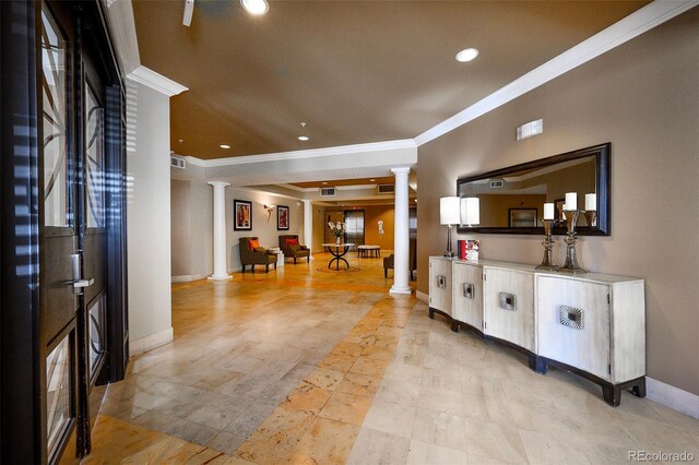 entrance foyer with baseboards, ornamental molding, recessed lighting, and ornate columns