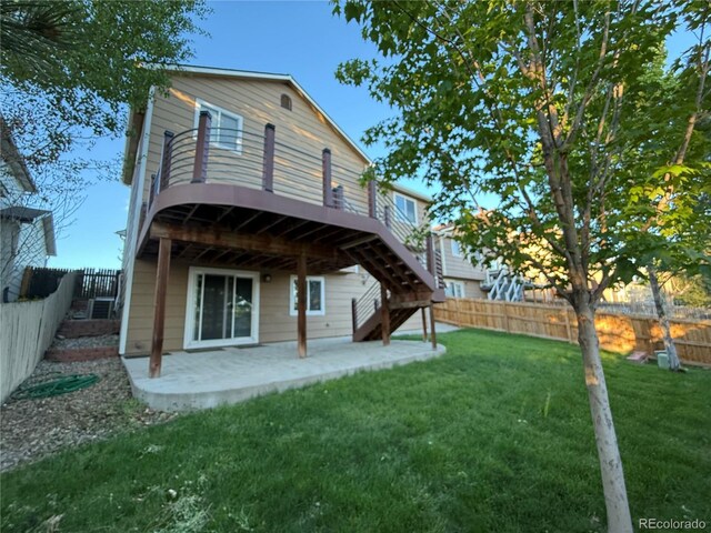 23760 Broadmoor Dr, Parker, CO 80138 - rear view of house featuring a patio, a wooden deck, and stairs