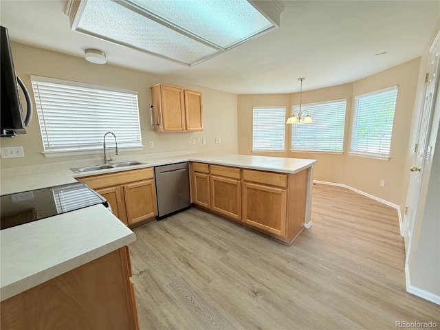 23760 Broadmoor Dr, Parker, CO 80138 - kitchen featuring stainless steel dishwasher, a sink, a peninsula, light wood-style floors, and light countertops