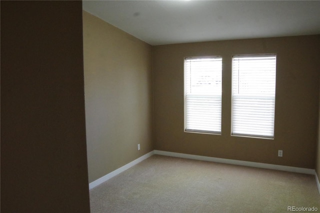 179 13th Ave, Cedaredge, CO 81413 - spare room with baseboards and light carpet
