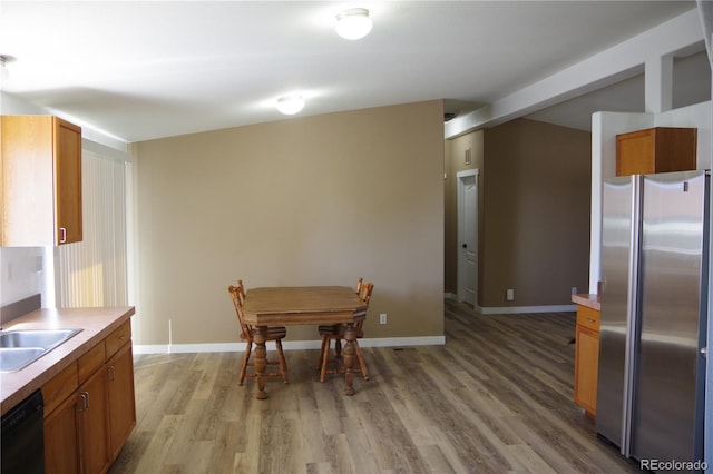 179 13th Ave, Cedaredge, CO 81413 - dining area featuring light wood-style flooring and baseboards