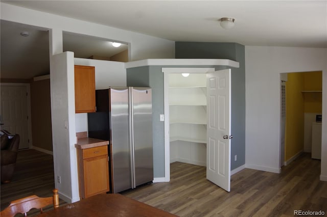 179 13th Ave, Cedaredge, CO 81413 - kitchen featuring freestanding refrigerator, baseboards, and wood finished floors
