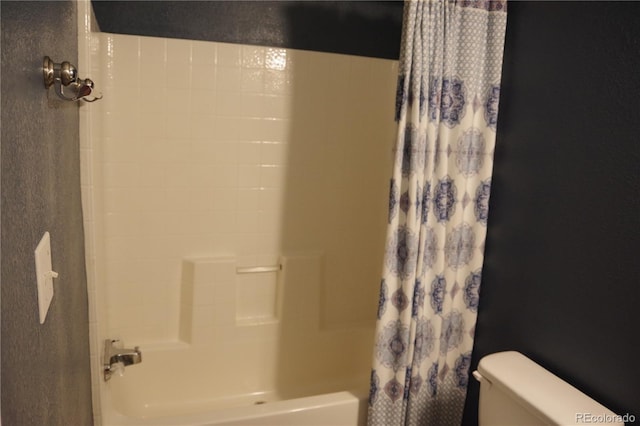 179 13th Ave, Cedaredge, CO 81413 - bathroom with toilet and shower / bath combo with shower curtain
