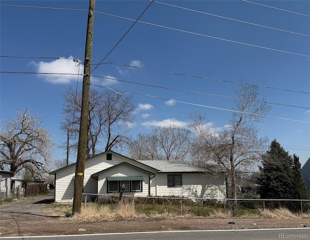 7750 Indiana St, Arvada, CO 80007 - view of front facade with a fenced front yard