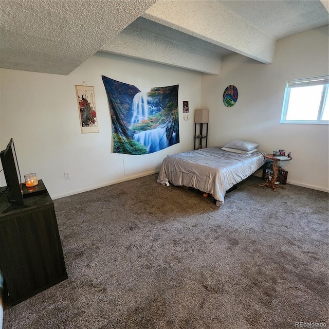 384 S Ironton St Unit 102, Aurora, CO 80012 - bedroom with a textured ceiling, carpet flooring, and beamed ceiling